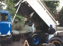 Power washing a dump truck