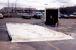 Environmental runoff from fleet washing can be eliminated by using portable washing mats