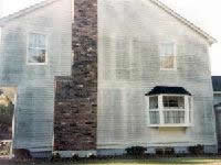 Moldy house - before power washing.